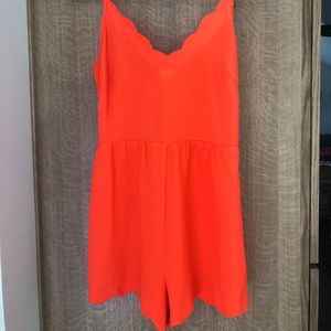 Lush orange scalloped romper